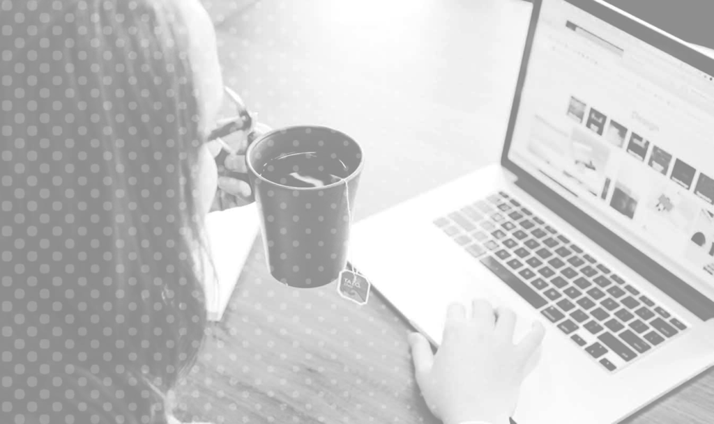 Grey image of a Student learning Business Management at Community Care College
