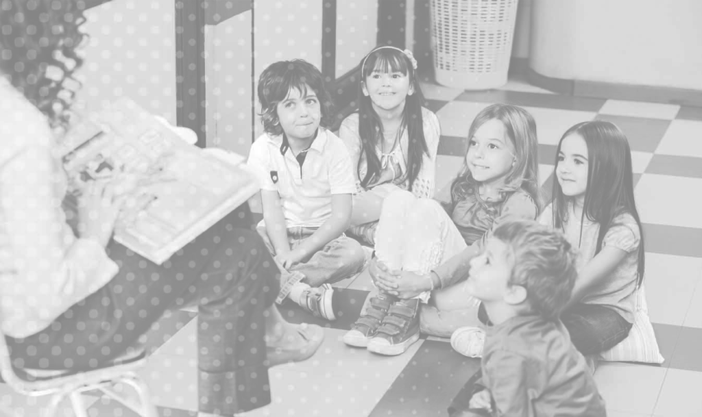Kids listening to Early Childhood Education Teacher read