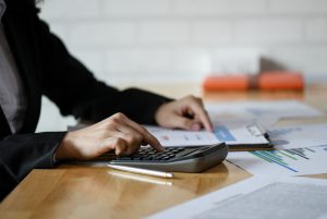 An accountant using a calculator